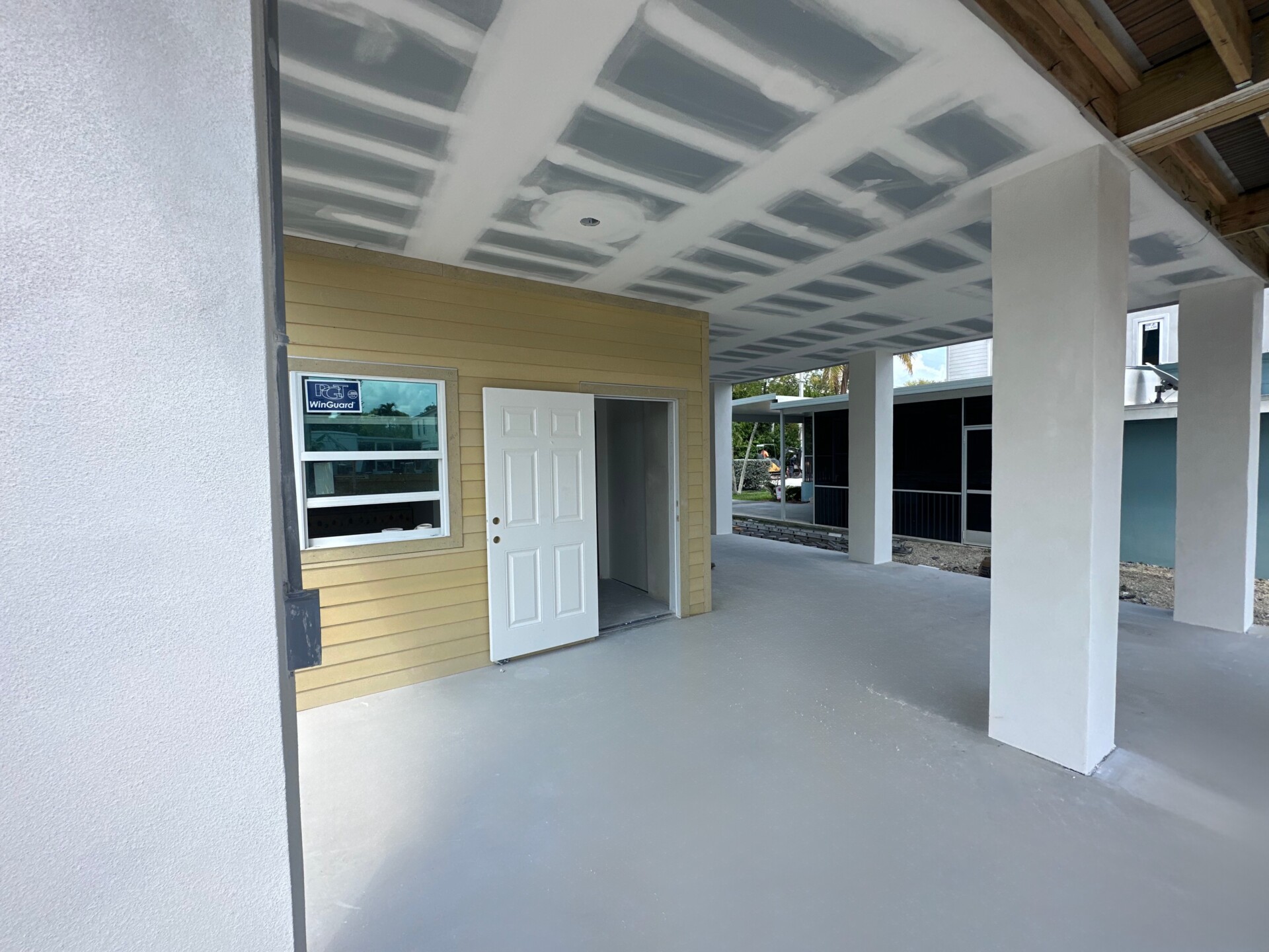 Drywall installation in a residential project 80 Coral Way Residence in Marathon, FL, Application in Exterior