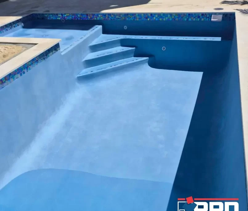 A pool with high-quality pool plaster application by Professional Plastering Designs, Inc. PPD, Marathon, Florida